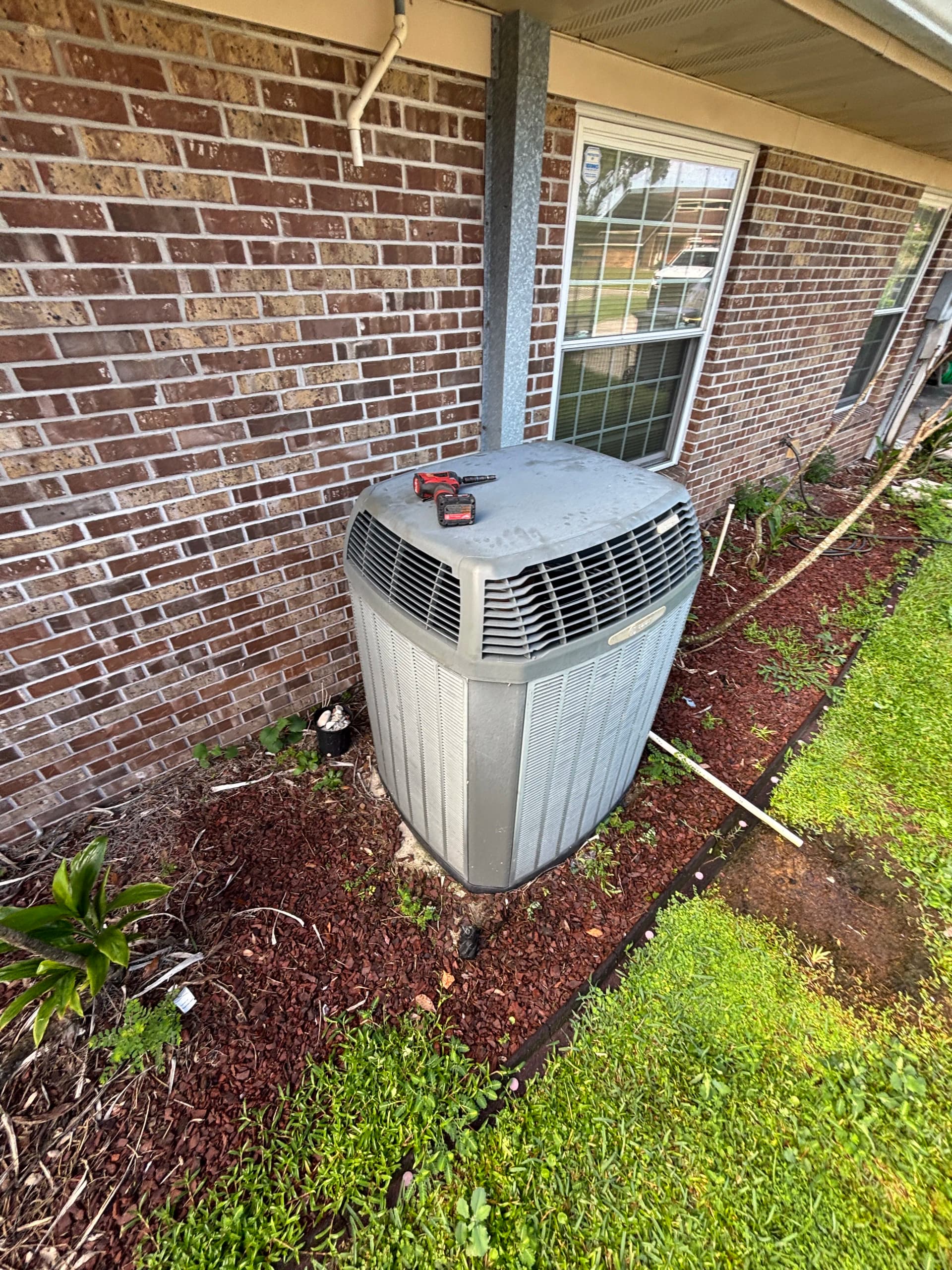 Old R22 Compressor Out - New Goodman AC System In image